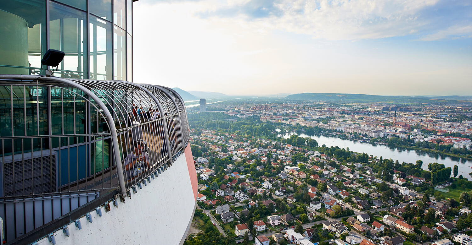 See the city from the top of the Danube Tower